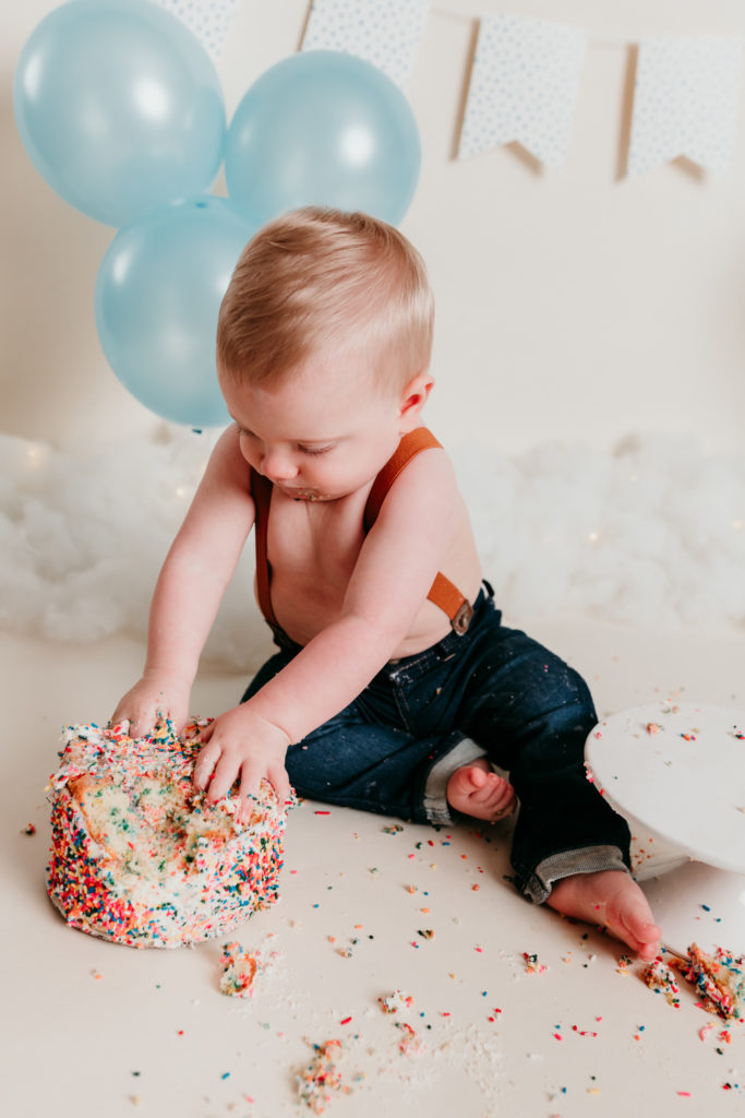  Robbie One Year Photos Cake Smash and Splash Session Valerie Clement Photography Kalispell Photographer