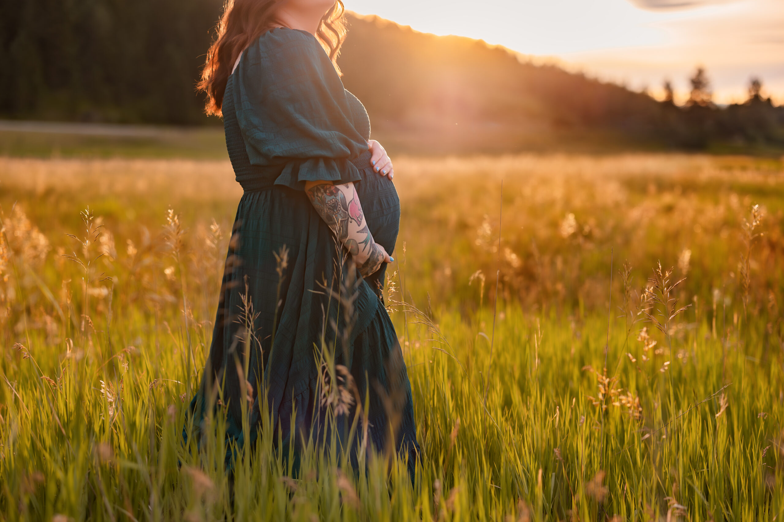 maternity photo taken at sunset